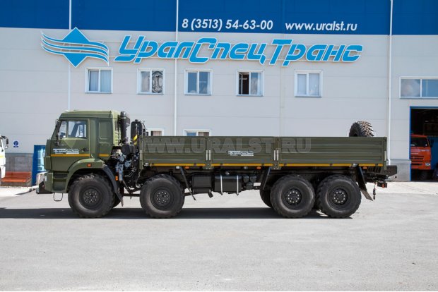 Автомобиль контейнеровоз Камаз 63501 с бортами