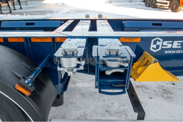 Контейнерная балка, фитинги для фиксации перевозимых контейнеров