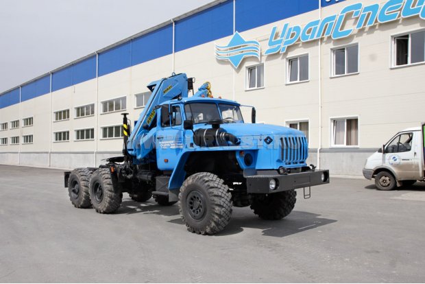 Тягач Урал 5557-60 с КМУ ИМ-150