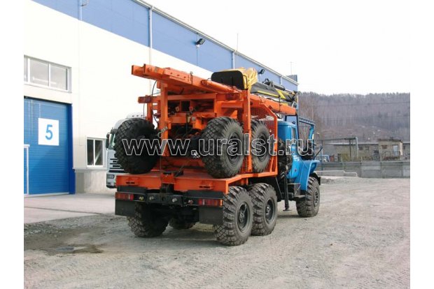 лесовозный автопоезд с манипулятором ОМТЛ 97 +УСТ 94651С УРАЛ 5557
