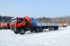 Седельный тягач IVECO-AMT с КМУ Palfinger PK-40002D и бортовым полуприцепом УСТ-94651