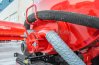 Обогревом лючка выхлопными газами