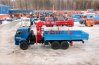 Бортовой автомобиль с неоткидным лесовозным коником