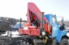 Седельный тягач Урал с КМУ Palfinger РK-15500