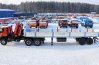 Седельный тягач IVECO-AMT с КМУ Palfinger PK-40002D и бортовым полуприцепом УСТ-94651