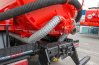 Обогревом лючка выхлопными газами