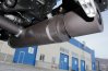 Система выпуска отработанных газов под передним бампером