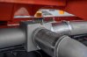 Система обогрева приемного лючка выхлопными газами