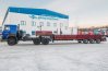 Полуприцеп тяжеловоз ППТ 26-32-11КБ УСТ 9465, уголковые трапы