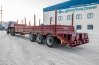 Полуприцеп тяжеловоз ППТ 26-32-11КБ УСТ 9465, уголковые трапы