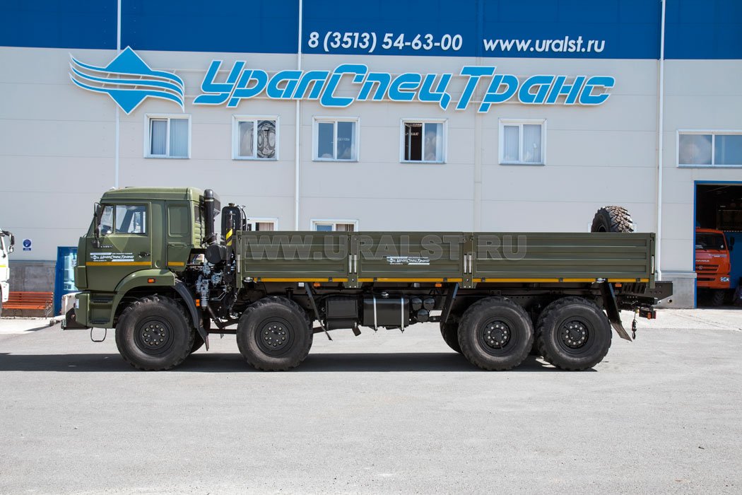 Автомобиль контейнеровоз Камаз 63501 с бортами