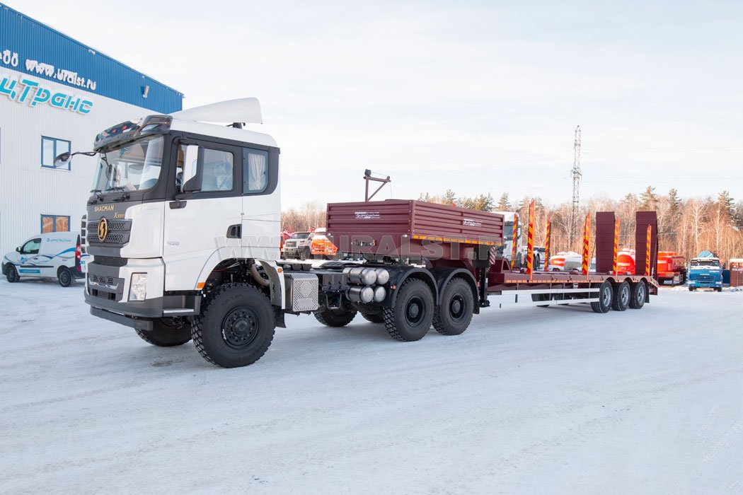 Полуприцеп-тяжеловоз 38-31-11КУ + Тягач SHACMAN 
