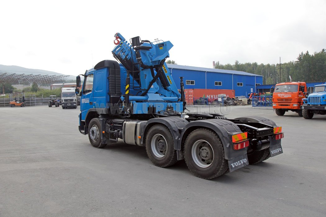 Тягач Volvo FM-Truck с КМУ ИМ-180-05