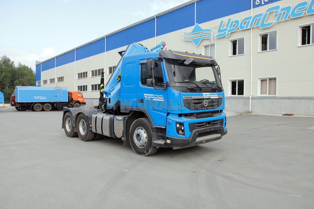 Тягач Volvo FM-Truck с КМУ ИМ-180-05