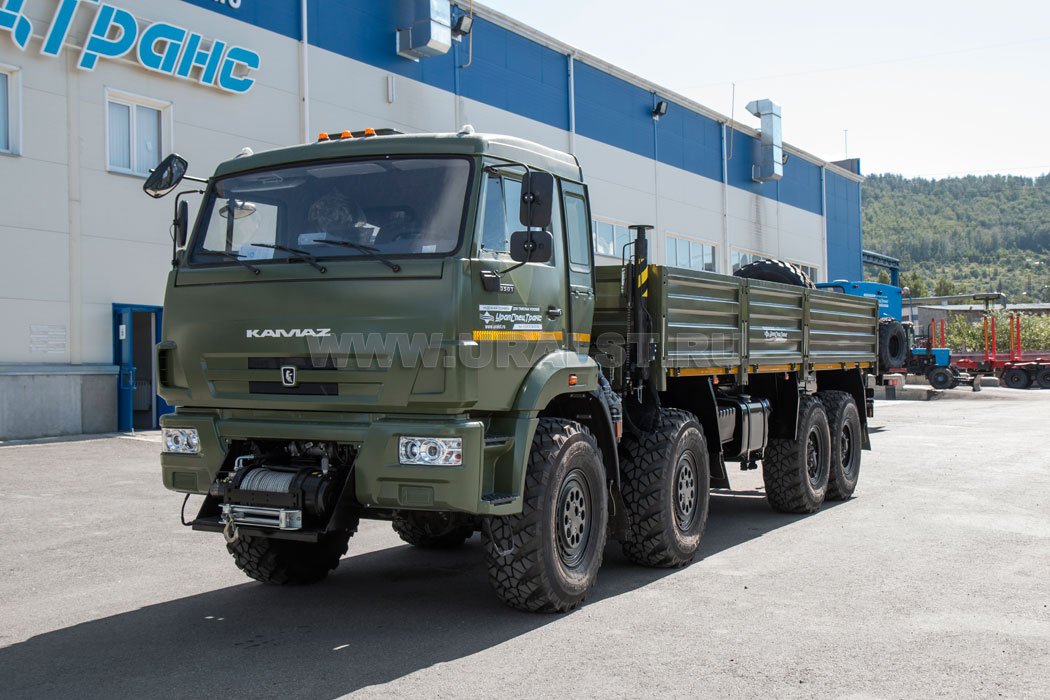 Автомобиль контейнеровоз Камаз 63501 с бортами